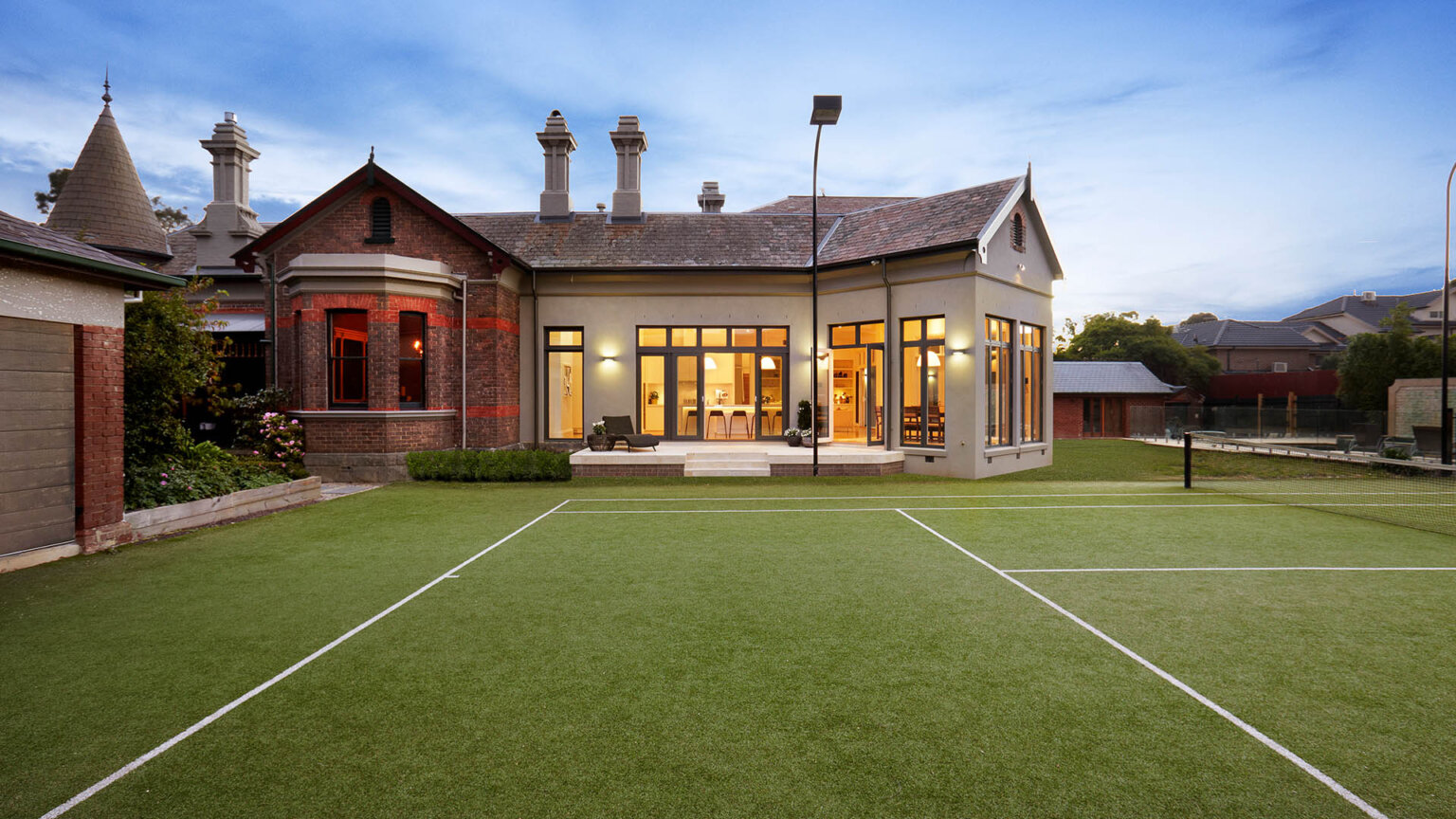 Hawthorn extension and renovations - outside view of tennis court and house