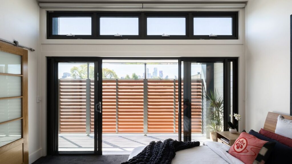 Blinds and curtains in the master bedroom