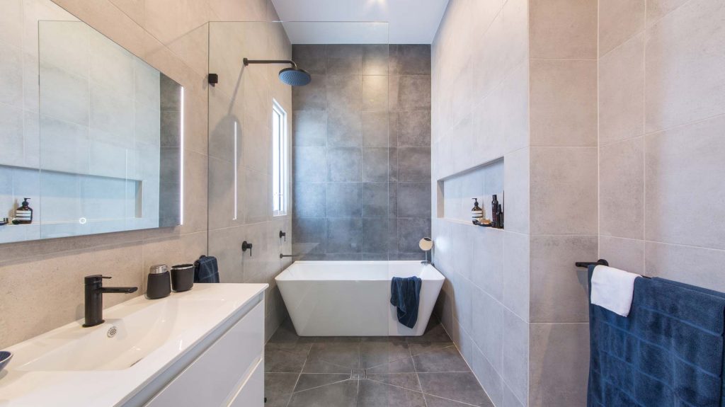 The Brunswick Western Project displays an ultra-modern bathroom with chic fittings and neutral tones.